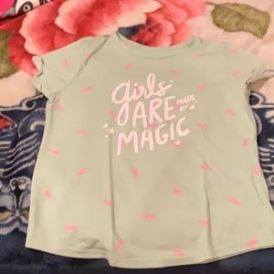 It has unicorns all around the shirt